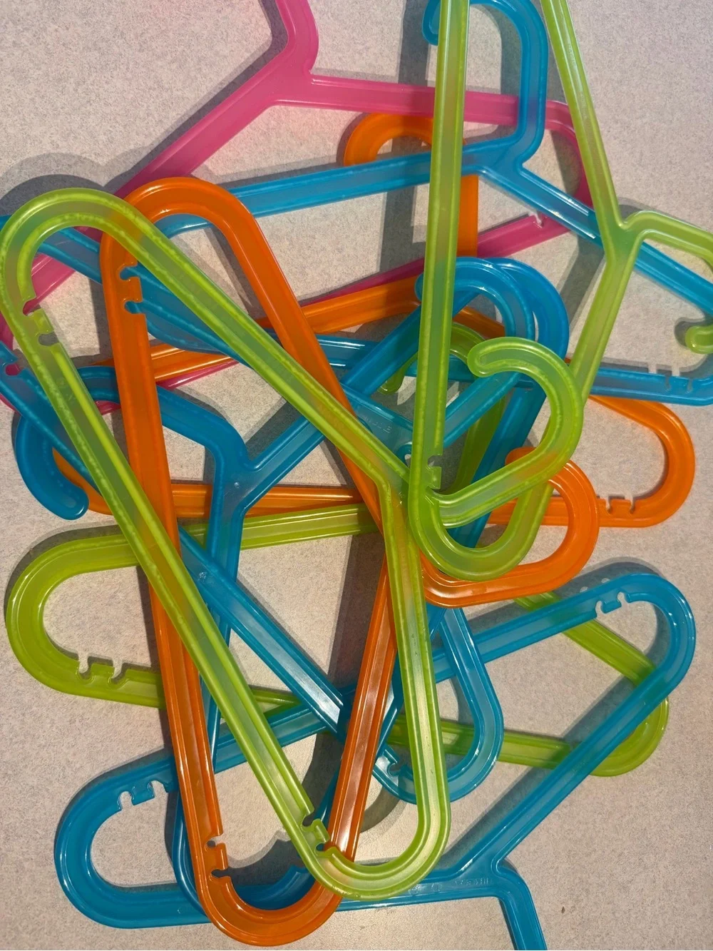 IKEA Kids Plastic Hangers in Blue, Orange, Green, Pink